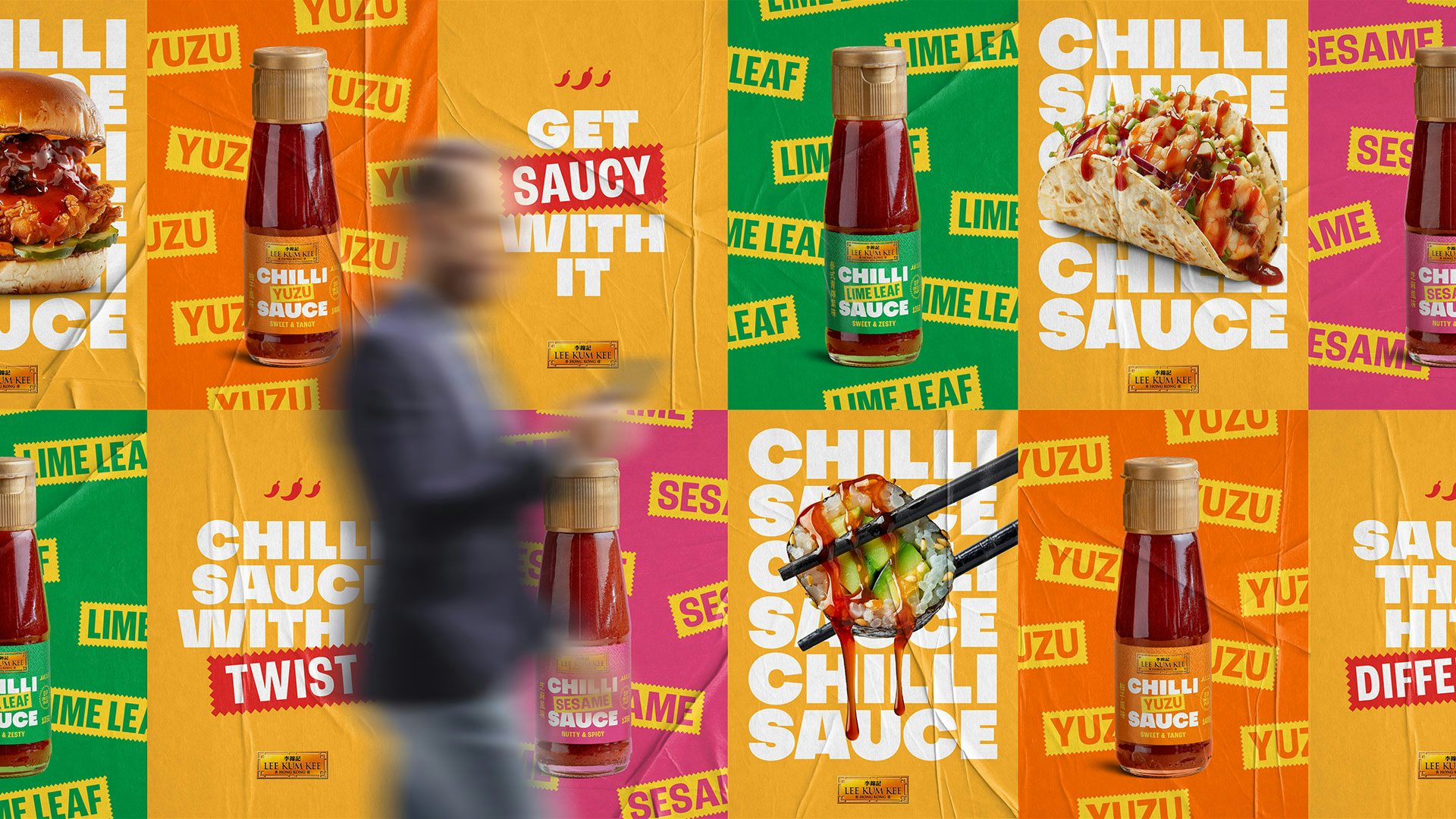 Outdoor flyposters for Lee Kum Kee chilli sauce, featuring the slogan 'get saucy with it' and a palette of green, orange and pink