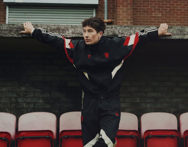 Barry Keoghan stands in Manchester United kit