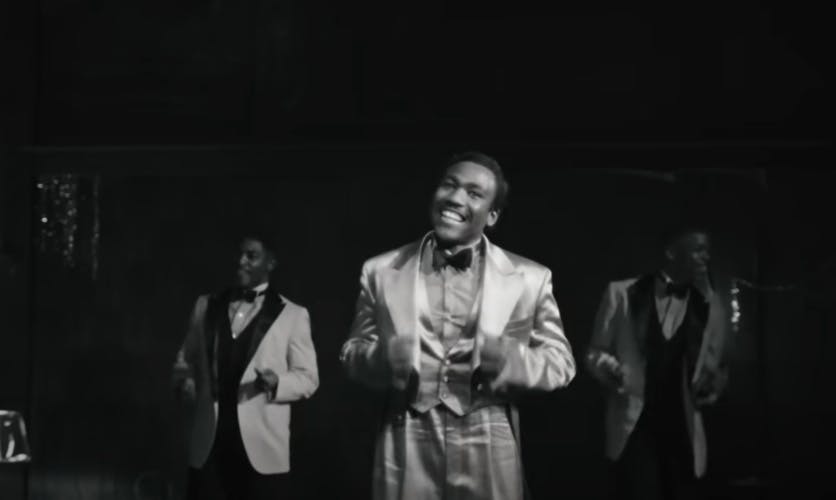 Black and white still of Childish Gambino in the jazz era from his music video Little Foot Big Foot